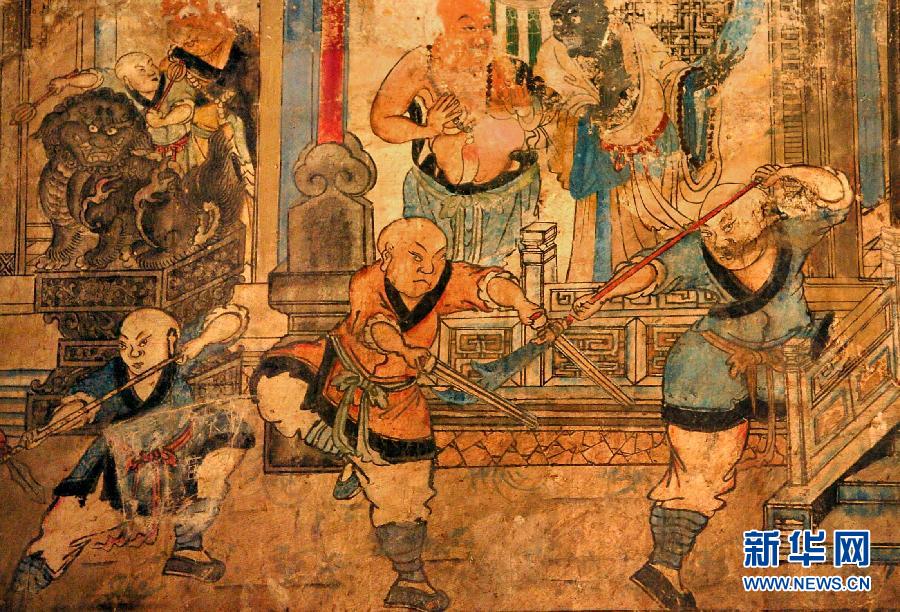 少林寺白衣殿內(nèi)的墻上表現(xiàn)少林武僧習(xí)武練拳的壁畫(局部,2005年9月15日攝)。