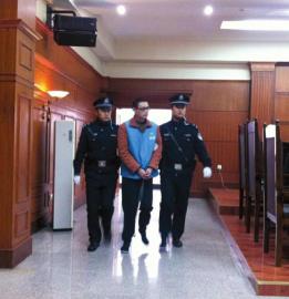 趙勇被帶上法庭。
