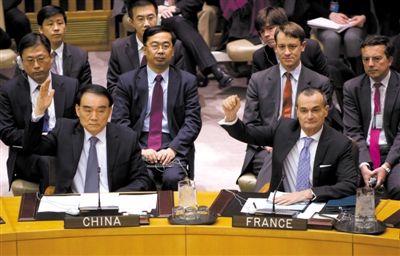 1月22日，紐約，中國常駐聯(lián)合國代表李保東舉手贊成通過對(duì)朝鮮制裁決議。