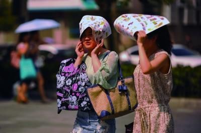 進(jìn)入7月份以來，南京出現(xiàn)了多個高溫天氣。本報資料圖片 劉瀏 攝