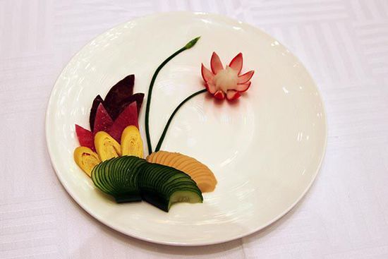 迎賓冷盤(pán)“洋花蘿卜”。 花惠生 供圖