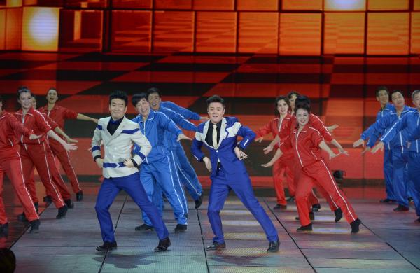 《小蘋果》、《最炫民族風(fēng)》等廣場舞曲將會有全國統(tǒng)一、編排科學(xué)、帶給人正能量的全新動(dòng)作。 CFP 資料
